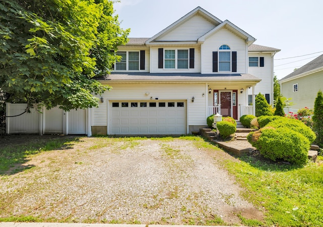 240 Highland Ave, Stratford, CT 06614 - view of front of house with an attached garage and driveway