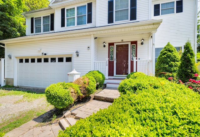 240 Highland Ave, Stratford, CT 06614 - traditional-style home featuring a garage and driveway