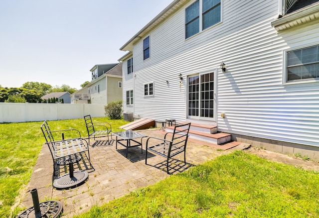 240 Highland Ave, Stratford, CT 06614 - back of property with a patio and entry steps