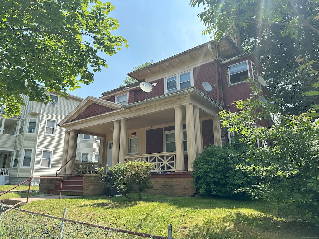 307 Winthrop Ave, New Haven, CT 06511 - view of front of house featuring covered porch and a front yard