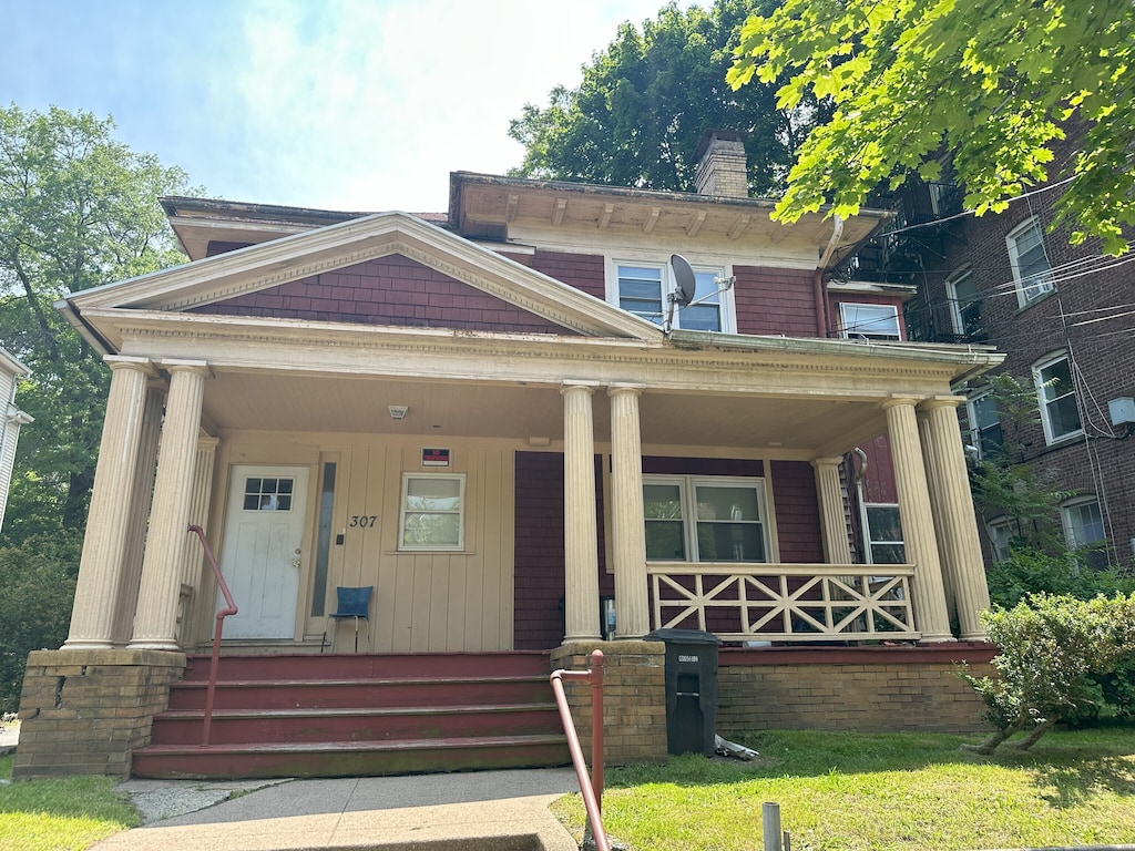 307 Winthrop Ave, New Haven, CT 06511 - view of front of property featuring a chimney and a porch