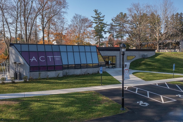 563 Main St, Ridgefield, CT 06877 - view of home's community with a lawn