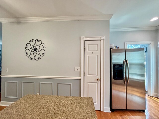 401 Cambridge Commons Unit 401, Middletown, CT 06457 - dining space with ornamental molding and light wood-style flooring