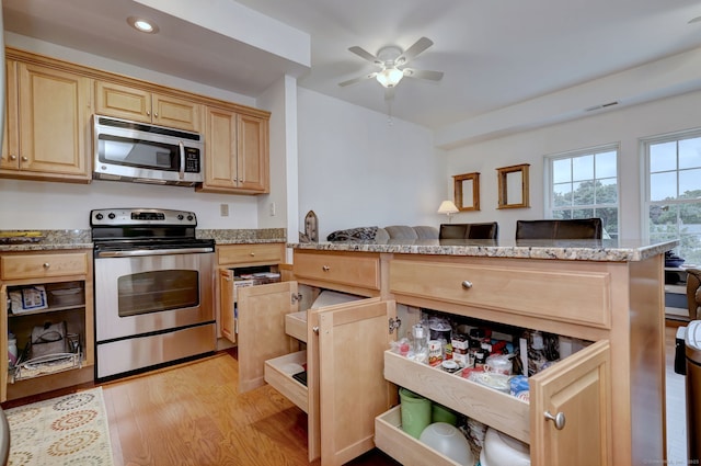 510 First Ave Unit 306, West Haven, CT 06516 - kitchen featuring stainless steel appliances, light brown cabinets, light wood-style flooring, a ceiling fan, and recessed lighting
