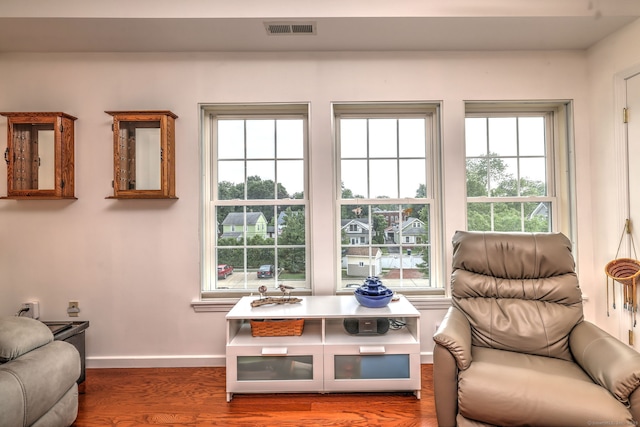 510 First Ave Unit 306, West Haven, CT 06516 - living area featuring plenty of natural light and wood finished floors