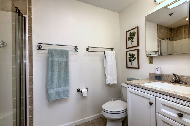 510 First Ave Unit 306, West Haven, CT 06516 - bathroom with vanity, tiled shower, and tile patterned floors