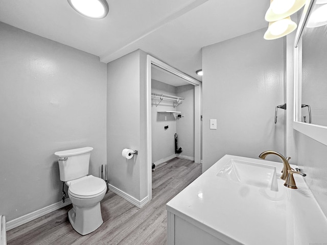 38 Hammond St, Vernon, CT 06066 - bathroom with wood finished floors and vanity