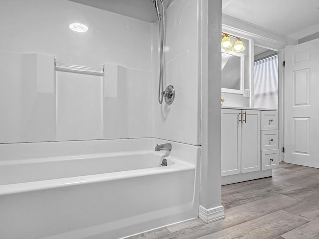 38 Hammond St, Vernon, CT 06066 - full bathroom featuring wood finished floors, bathtub / shower combination, and vanity
