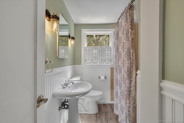 57 Whitney Rd, Columbia, CT 06237 - full bath featuring wainscoting, wood finished floors, and a shower with curtain
