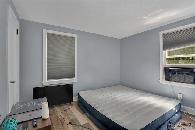 57 Whitney Rd, Columbia, CT 06237 - bedroom with wood finished floors and cooling unit