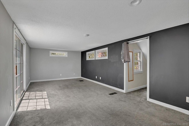 57 Whitney Rd, Columbia, CT 06237 - spare room with a textured ceiling and carpet