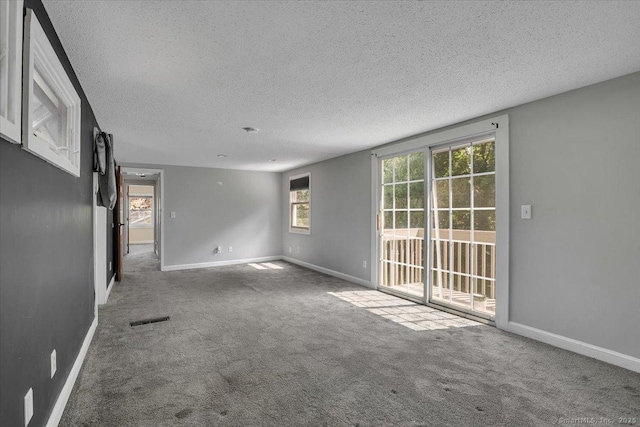 57 Whitney Rd, Columbia, CT 06237 - spare room featuring a textured ceiling and carpet flooring