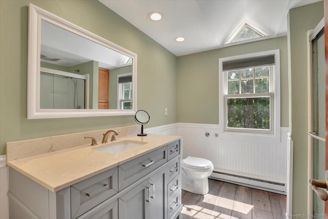57 Whitney Rd, Columbia, CT 06237 - bathroom featuring a baseboard radiator, wainscoting, vanity, plenty of natural light, and wood finished floors