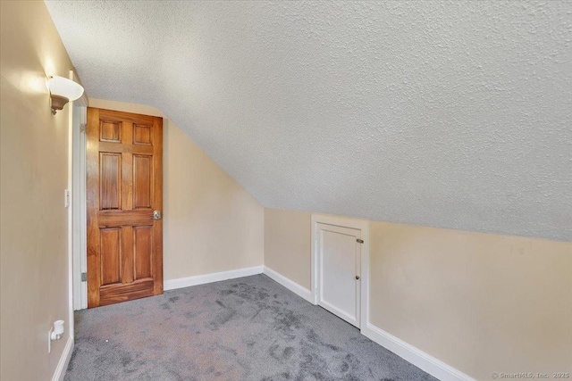 57 Whitney Rd, Columbia, CT 06237 - additional living space featuring a textured ceiling, carpet floors, and lofted ceiling