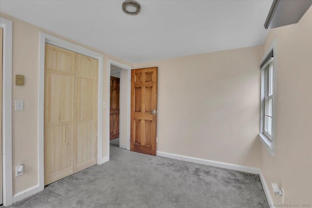 57 Whitney Rd, Columbia, CT 06237 - unfurnished bedroom with carpet and a closet
