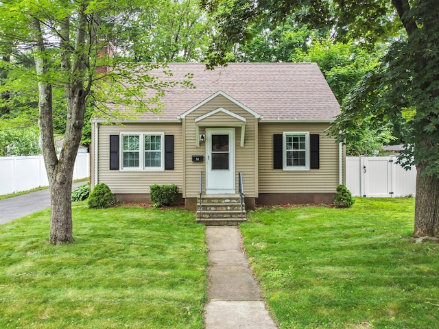 51 Goodwin St, Manchester, CT 06040 - view of front of property with entry steps, a shingled roof, and a gate