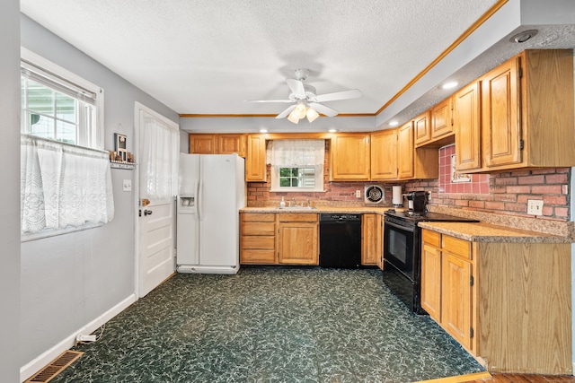 51 Goodwin St, Manchester, CT 06040 - kitchen with black appliances, backsplash, light countertops, a ceiling fan, and dark floors