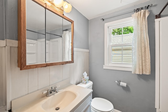 51 Goodwin St, Manchester, CT 06040 - full bathroom with vanity, wainscoting, and a shower with shower curtain