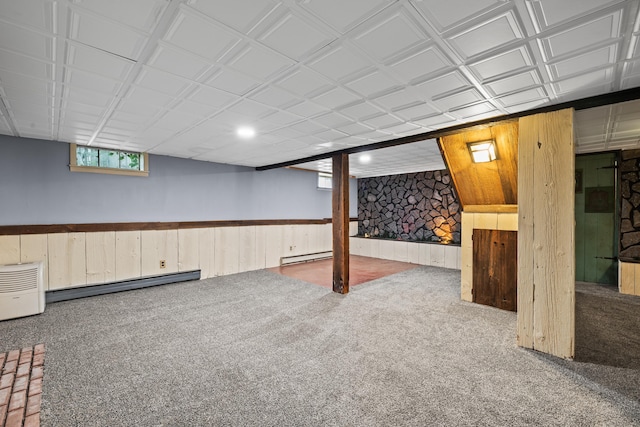 51 Goodwin St, Manchester, CT 06040 - basement with a baseboard radiator, carpet flooring, baseboard heating, wooden walls, and wainscoting