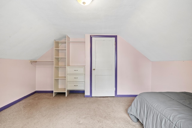 51 Goodwin St, Manchester, CT 06040 - carpeted bedroom with baseboards and lofted ceiling