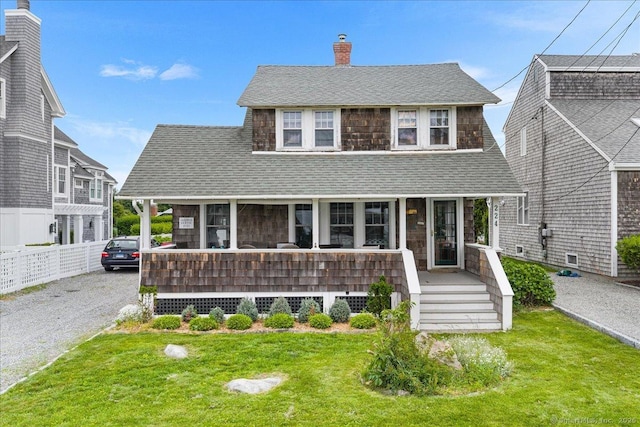 224 W Shore Ave, Groton, CT 06340 - view of front facade featuring covered porch, a front lawn, and a shingled roof