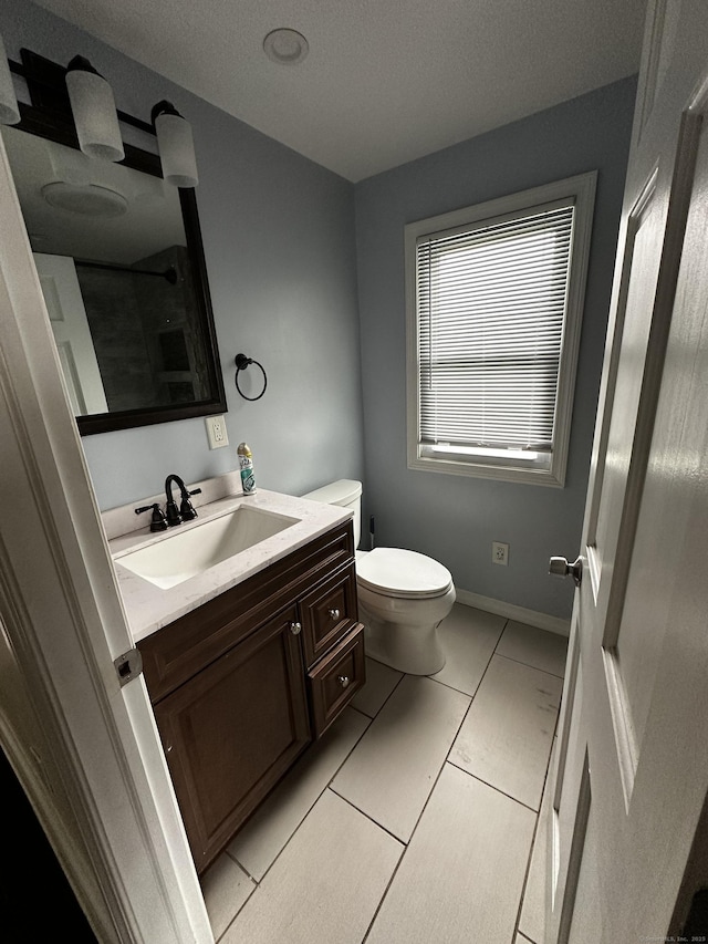 82 Trowbridge Pl, Naugatuck, CT 06770 - bathroom with vanity, tile patterned floors, a shower, and a textured ceiling