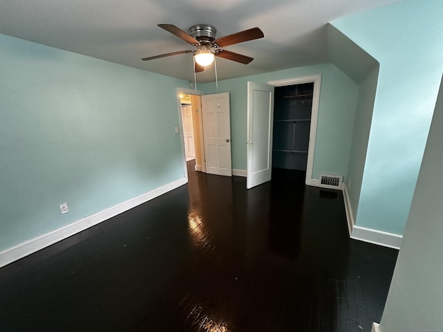 82 Trowbridge Pl, Naugatuck, CT 06770 - unfurnished bedroom with a closet, dark wood-style flooring, and a ceiling fan