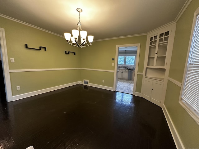 82 Trowbridge Pl, Naugatuck, CT 06770 - unfurnished dining area with a chandelier, crown molding, and dark wood-style floors