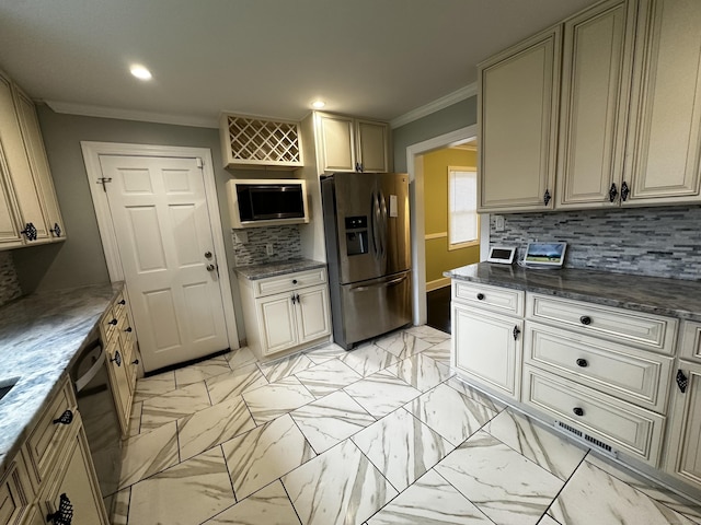82 Trowbridge Pl, Naugatuck, CT 06770 - kitchen with appliances with stainless steel finishes, crown molding, cream cabinets, backsplash, and recessed lighting