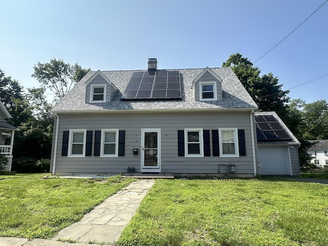 82 Trowbridge Pl, Naugatuck, CT 06770 - cape cod house with solar panels, a front yard, and a chimney