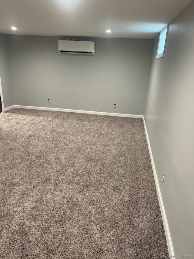 82 Trowbridge Pl, Naugatuck, CT 06770 - basement featuring a wall mounted air conditioner, carpet flooring, and recessed lighting