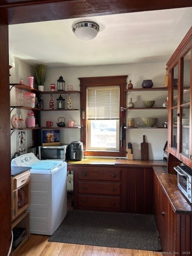 1085 Hamilton Ave, Waterbury, CT 06706 - laundry room featuring washer / dryer and light wood-style floors