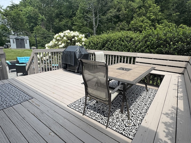 20 Celestial Ln, Wallingford, CT 06492 - deck featuring outdoor dining area, grilling area, outdoor lounge area, and a wooded view
