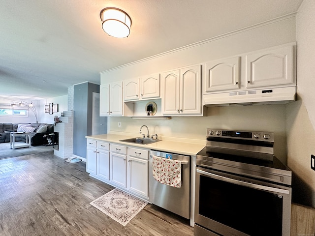 11 Polk Ln, Windsor Locks, CT 06096 - kitchen with appliances with stainless steel finishes, under cabinet range hood, light wood-style floors, white cabinetry, and light countertops