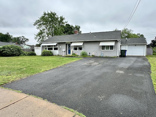 11 Polk Ln, Windsor Locks, CT 06096 - ranch-style house with a chimney, driveway, and an attached garage