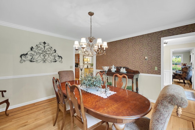 427 Long Mountain Rd, New Milford, CT 06776 - dining space with a chandelier, light wood-style flooring, crown molding, and wallpapered walls