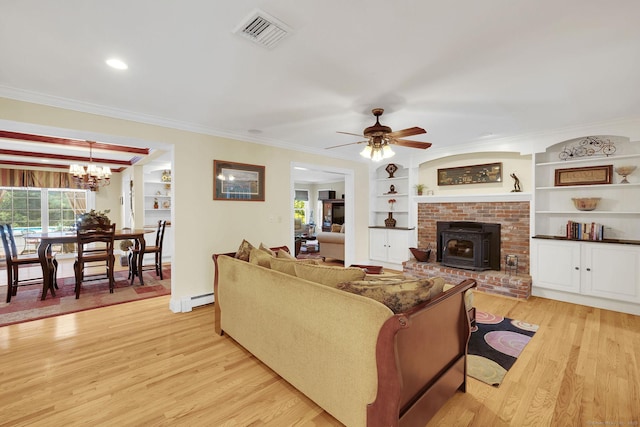 427 Long Mountain Rd, New Milford, CT 06776 - living area with a baseboard radiator, light wood finished floors, crown molding, ceiling fan, and a chandelier