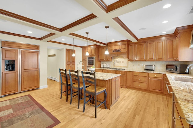 427 Long Mountain Rd, New Milford, CT 06776 - kitchen with appliances with stainless steel finishes, a baseboard heating unit, light wood-style flooring, tasteful backsplash, and beam ceiling