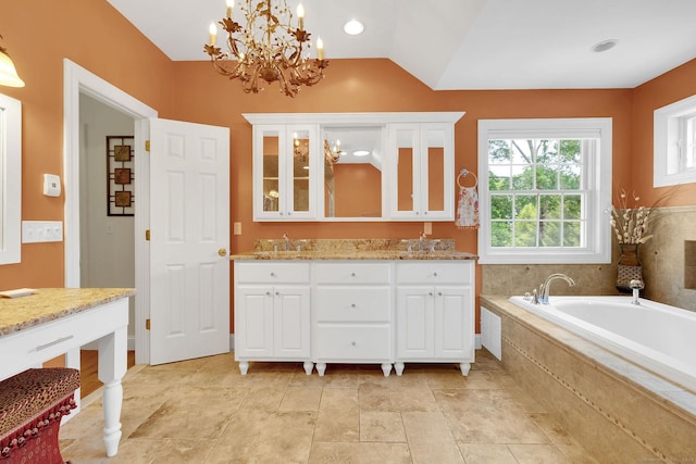 427 Long Mountain Rd, New Milford, CT 06776 - full bath with double vanity, a garden tub, a chandelier, and lofted ceiling