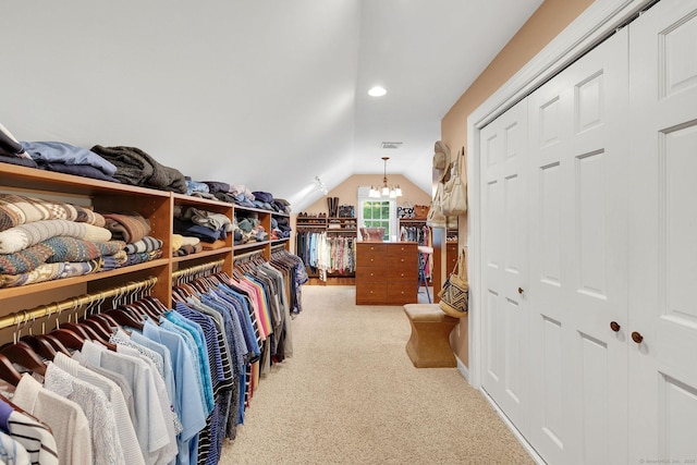 427 Long Mountain Rd, New Milford, CT 06776 - spacious closet featuring vaulted ceiling, light carpet, and a chandelier