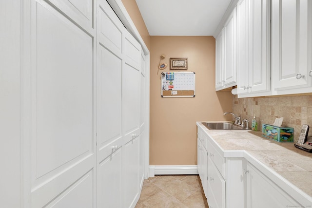 427 Long Mountain Rd, New Milford, CT 06776 - laundry area with a sink and light tile patterned floors