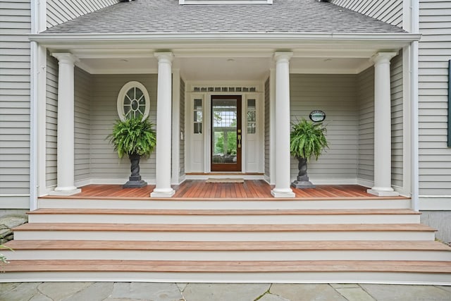 21 Oak Ridge Park, Westport, CT 06880 - doorway to property featuring roof with shingles and a porch