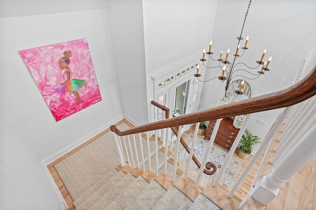 21 Oak Ridge Park, Westport, CT 06880 - stairs with a chandelier and wood finished floors