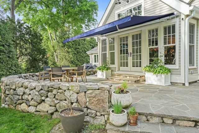 21 Oak Ridge Park, Westport, CT 06880 - view of patio / terrace featuring french doors and outdoor dining space