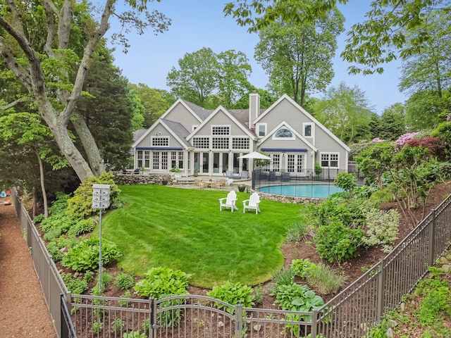 21 Oak Ridge Park, Westport, CT 06880 - back of property featuring a chimney, a fenced backyard, and french doors