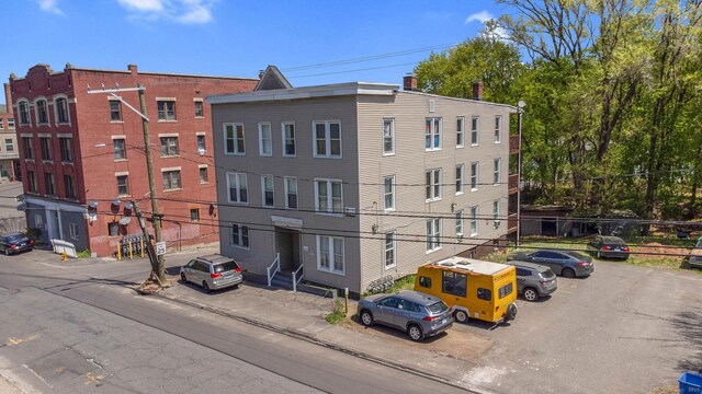 203 S Leonard St, Waterbury, CT 06708 - view of building exterior featuring uncovered parking