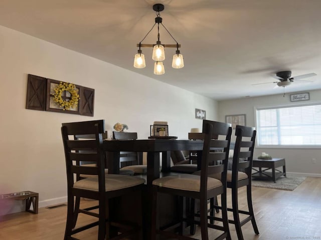 330 Crystal Ave Unit 20, New London, CT 06320 - dining room featuring wood finished floors and ceiling fan