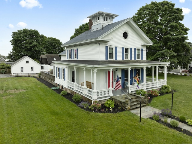 122 College St, Old Saybrook, CT 06475 - view of front of home with a porch, a front lawn, and a shingled roof