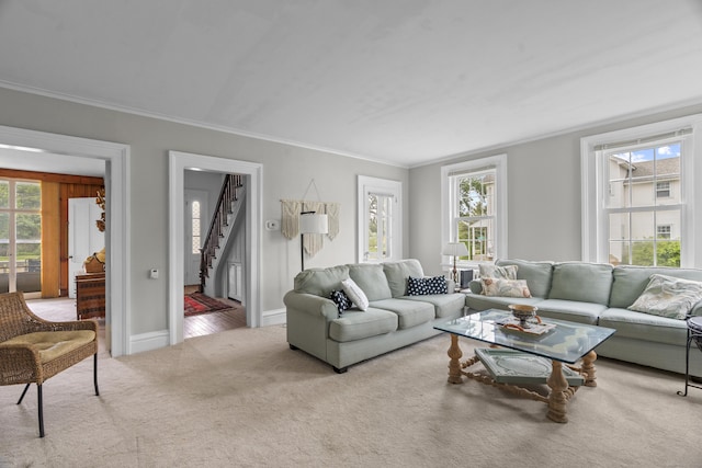 122 College St, Old Saybrook, CT 06475 - carpeted living room with ornamental molding and stairway