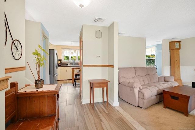 133 Savage Hill Rd, Berlin, CT 06037 - living room with healthy amount of natural light and light wood-type flooring
